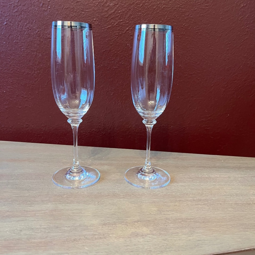2 Champagne Flutes with Silver Trim on Rims